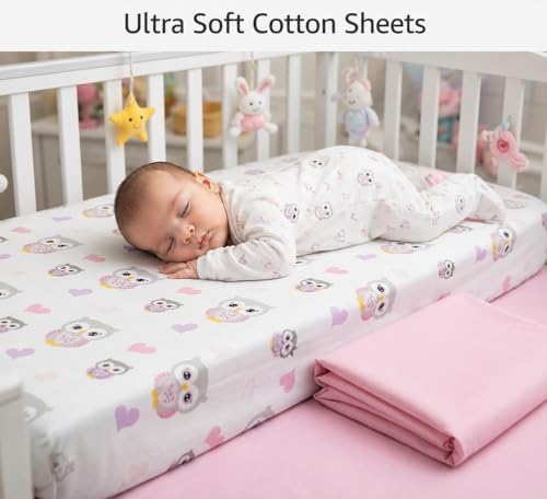 Image of EVERYDAY KIDS 2 Pack Fitted Girls Crib Sheet, 100% Soft Breathable Cotton Baby Sheet, Fits Standard Size Crib Mattress 28in x 52in, White Nursery Sheet with Pink Owls and Hearts and a Solid Pink