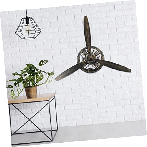 Décoration murale avion hélice Cabilock en métal pour style industriel unique
