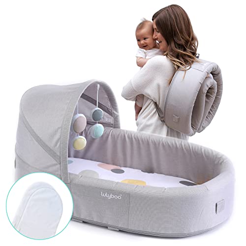 Image of Lulyboo Portable Baby Travel Lounge & Playpen - Indoor/Outdoor Cuddle & Play Baby Bed, Adjustable Backpack, Waterproof, Lightweight, Includes Changing Pads, Plush Toys & Removable Canopy (Bubble 2)
