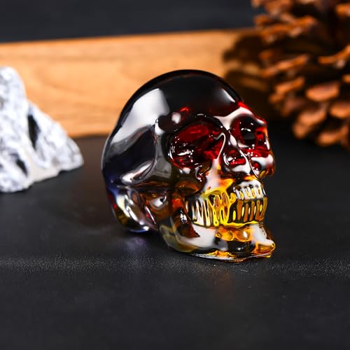 Figurines de tête de mort en cristal aux reflets incandescents