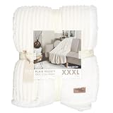 Douceur Exceptionnelle : Fabriqué en polyester, ce plaid offre un toucher ultra doux, transformant chaque moment de détente en une expérience luxueuse et apaisante
