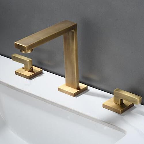 Grifo de lavabo bimando de diseño europeo en latón gris de tres huecos para baño premium