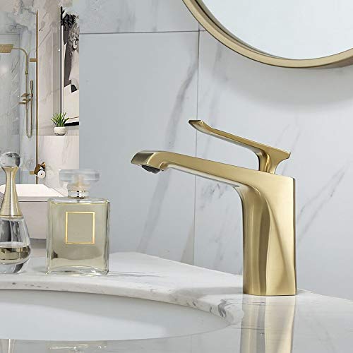 Robinet de lavabo à double poignée or pour une routine bien-être