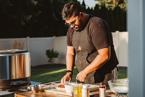 Image of Solo Stove Apron | Durable Canvas Cooking Apron with Adjustable Straps, 6 Pockets, and Towel Loop - Perfect for Men and Women Chefs - Black, 600D Canvas Material, Onesize