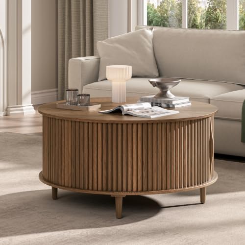 Image of JOINICE 31.5 inch Round Coffee Table with Storage for Living Room, Walnut | Hidden Storage,Fluted Sliding Door,Mid Century Furniture for Small Apartments,Solid Wood Legs,Easy Assembly,Up to 110 lbs