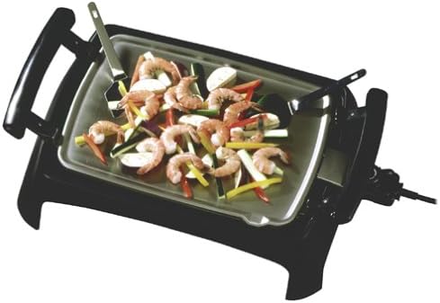 George Foreman GR55 Five Star Grill with shrimp and sliced vegetables (zucchini, bell peppers) being stir-fried on the flat cooking surface, with cooking utensils.