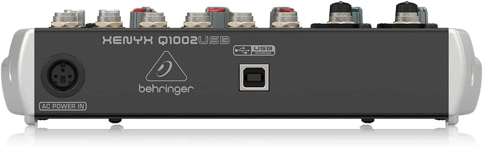 പിൻഭാഗം view of the Behringer XENYX Q1002USB mixer showing the AC Power In and USB Interface ports.