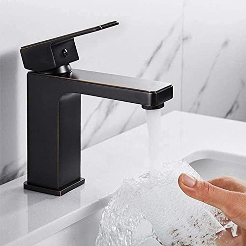 Robinet de lavabo noir mat au design épuré pour vanité de salle de bains moderne