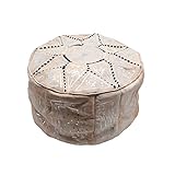 Pouf fait à la main. Ils peuvent contenir des taches et des pigments typiques du processus de fabrication.