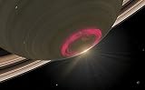 Posterazzi A cherry-red aurora hovering over Saturn's south pole Poster Print, (34 x 21)