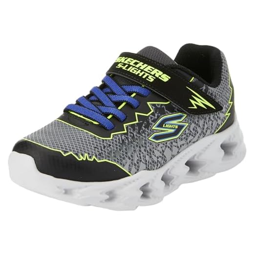 Skechers Boys, Zapatillas Unisex niños, Negro Sintético Amarillo Azul Borde, 32 EU