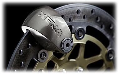 Xena XX6-SS Disc Lock Alarm installed on a motorcycle brake disc