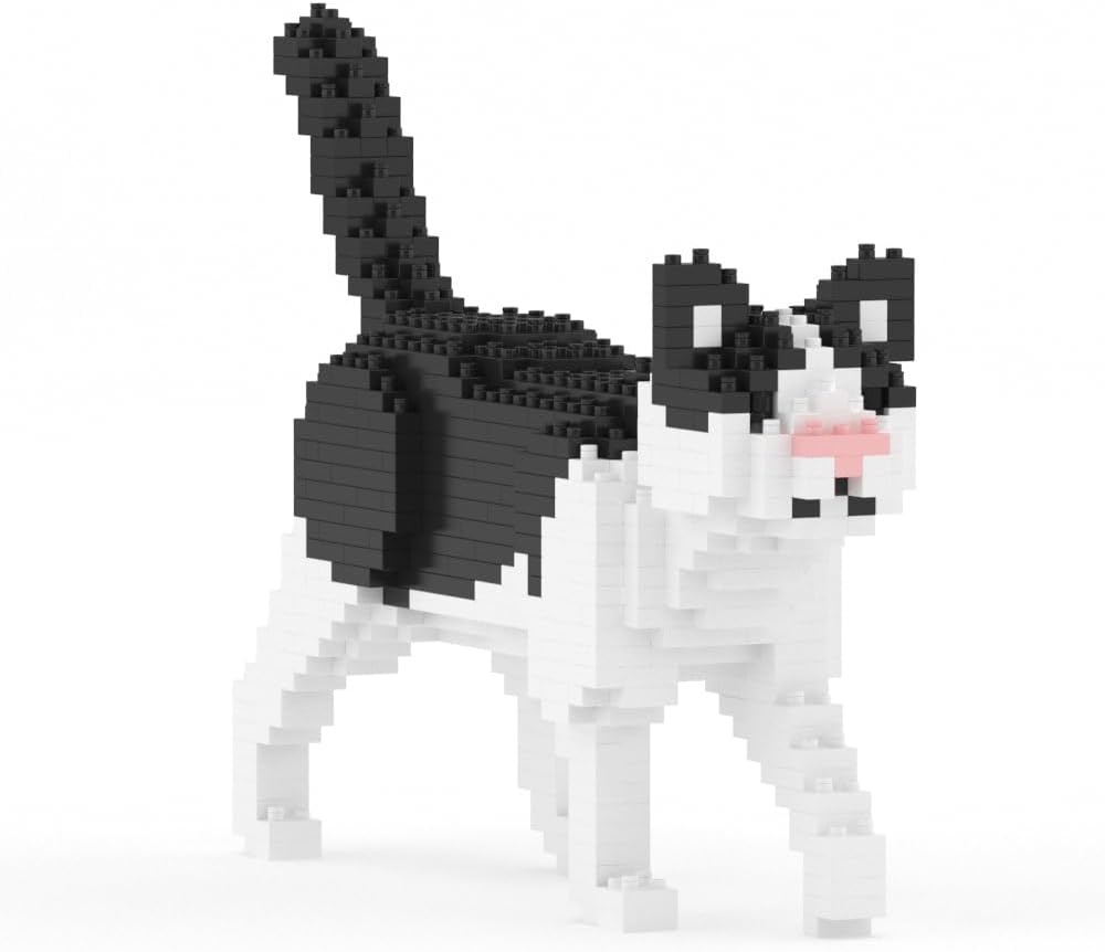 Completed JEKCA Black and White Cat Mini 01S model, viewed from the front side, showing its walking pose.
