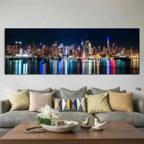Peinture sur toile ville lumineuse grand format pour creer un salon moderne et chaleureux