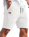 short stretch noir femme Design et Détails: Avec cordon de serrage élastique à la ceinture, trois poches pratiques et une élégante étiquette en cuir à l'avant. Un style moderne alliant fonctionnalité et esthétique