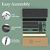 All components of the Zinus Judy bed frame laid out for assembly, including the headboard, side rails, support beams, wood slats, and a box containing hardware and tools.