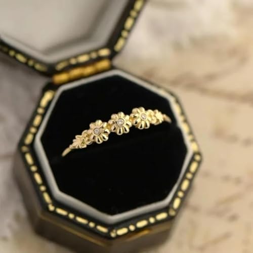 Bijoux party : bague fleur dorée et pierre blanche pour vos soirées - 2