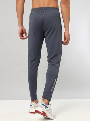 Image of TECHNOSPORT Men's Slim Fit Track Pants with Zip Pockets, ELASTO Plus Quick Dry Stretchable Lightweight Lower for Gym Running Yoga and Sports