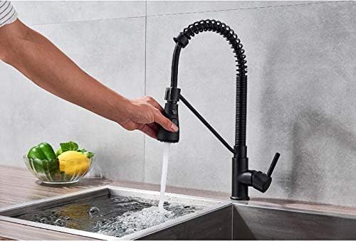 Robinet d'eau chaude froide au design chromé brillant avec col de cygne à ressort
