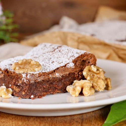 Torta alle noci e cioccolato senza farina: la ricetta intensa e spumosa dal cuore fondente