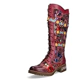 Das Zusammenspiel aus hochwertigem Leder und robustem Textil wird durch ein farbenfrohes Blumenmuster akzentuiert.