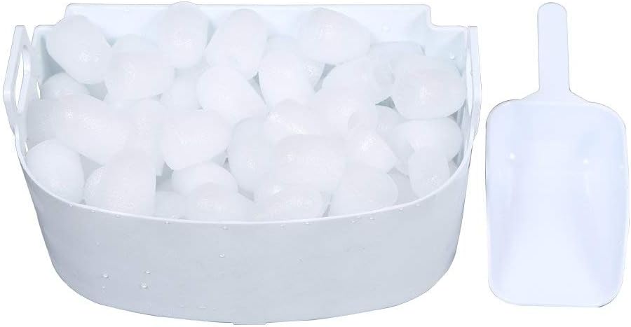 Close-up of the ice basket filled with bullet ice cubes and a white ice scoop next to it.