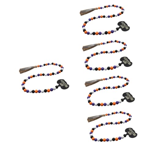 Guirlande perles de bois avec pompons decoration rustique