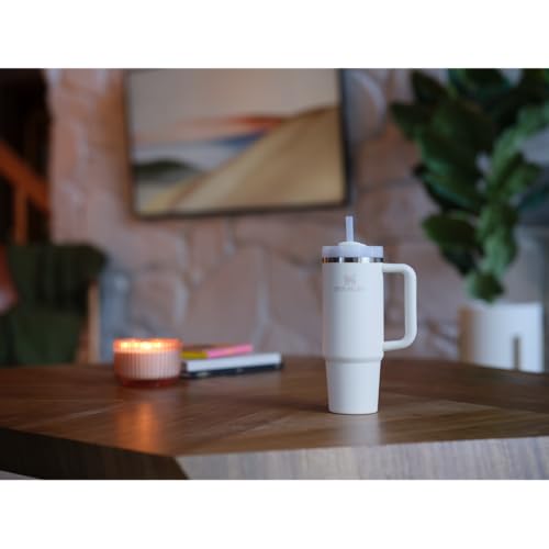 Image of Stanley Quencher H2.0 Tumbler with Handle and Straw 30 oz | Flowstate 3-Position Lid | Cup Holder Compatible for Travel | Insulated Stainless Steel Cup | BPA-Free | Cream 2.0