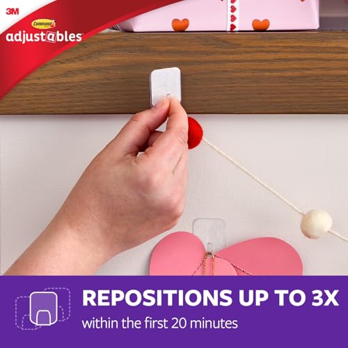 Command Adjustables Repositionable Light Clips, 16 Hooks, 36 Strips, Easy to Use & Reposition, Damage-Free Decoration Clips, Each Clip Can Hold Up to 0.5 lbs. - image 3