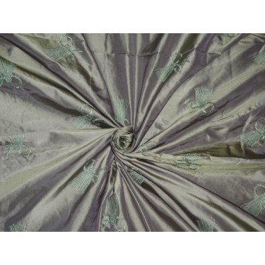 Tissu en taffetas de soie pour confectionner une robe de soirée vert irisé et violet