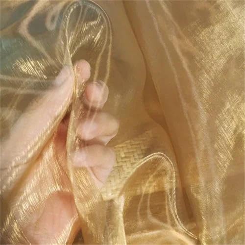 Tissu organza dégradé pour coudre une robe de soirée volumineuse et aérienne