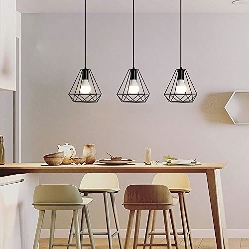 Chandelier industriel retro LED cage en fer pour sublimer un eclairage de table
