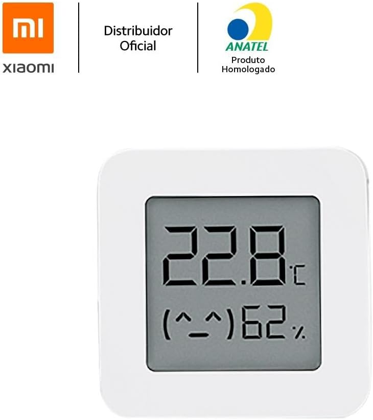 Close-up of the Xiaomi Temperature and Humidity Monitor 2 display showing 22.8 degrees Celsius and 62% humidity with a neutral face icon.