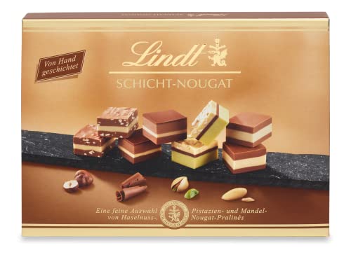 Lindt Schokolade - Royal Pralinen | 300 g & Schokolade - Schicht-Nougat Pralinen | 125 g | Pralinés-Schachtel mit 12 von Hand geschichteten Mandel-, Haselnuss- und Pistazien-Nougat Spezialitäten