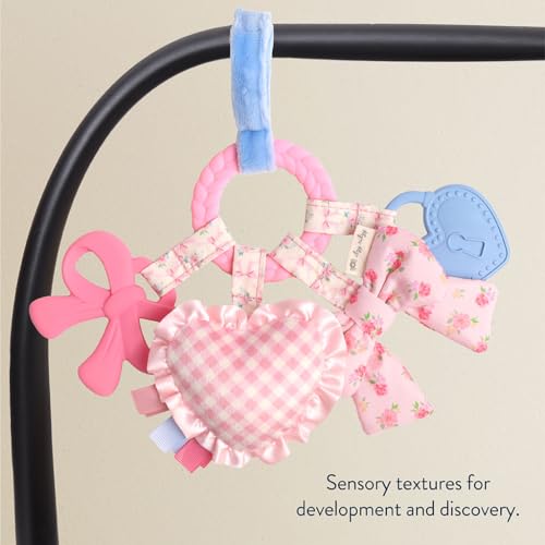 Image of Itzy Ritzy Teething Activity Toy - Bitzy Busy Ring Infant Teething Toy Features Braided Teether & Dangling Toys, Includes Textured Ribbons, Crinkle Sound & Jingle Bell - 0 Months & Up (Pink Bow)