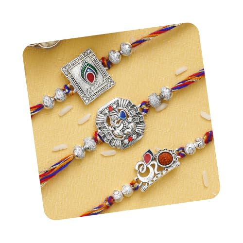 Image of eCraftIndia Set of 3 Rakhi Combo Hamper | Om Krishna Peacock Feather Lord Ganesha Silver Religious Designer Rakhis | Roli Chawal Pack