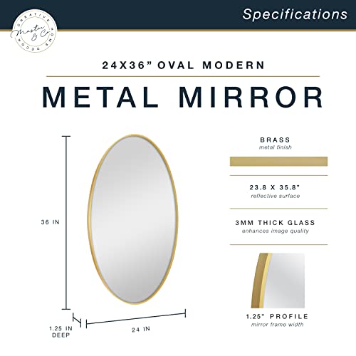 Image of MCS Master & Co. Modern Metal Large Wall Mirror, Minimalist Home Decor Oval Mirror for Living Room, Bedroom, or Bathroom, 24 by 36 Inch, Brass