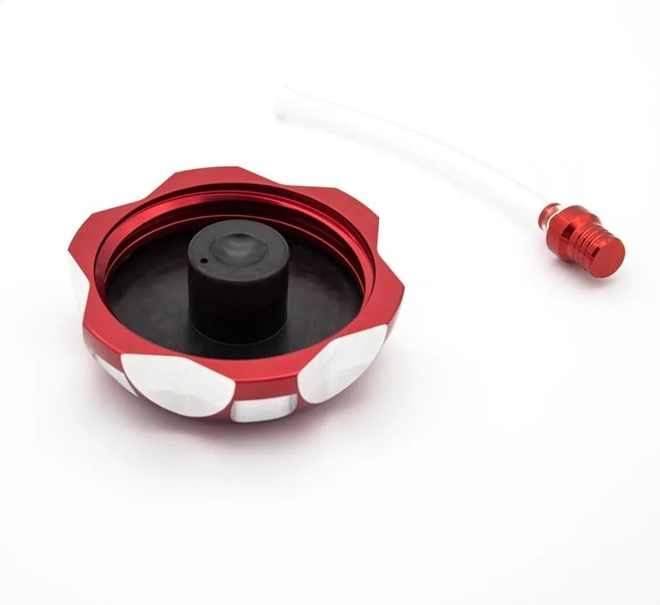 Underside view of red motorcycle fuel tank cap