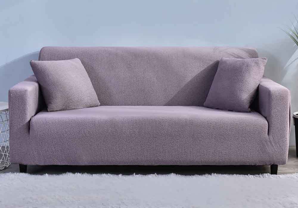 Housse de canapé douce et extensible violette pour un salon accueillant et coloré