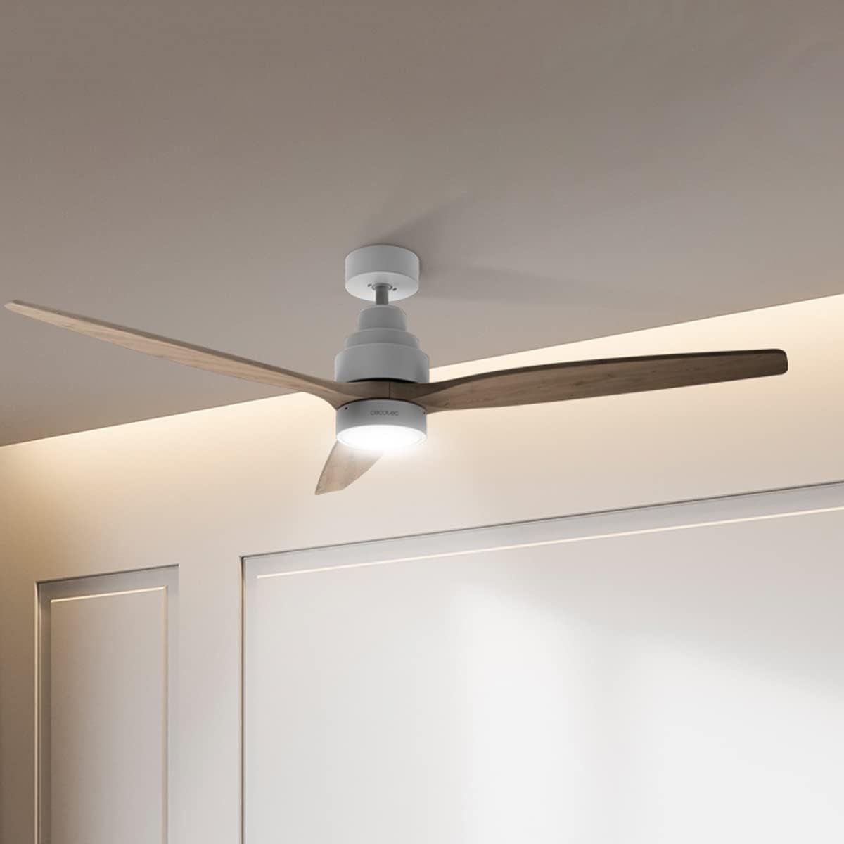 Cecotec EnergySilence Aero 5300 Ceiling Fan installed in a room with its LED light illuminated.