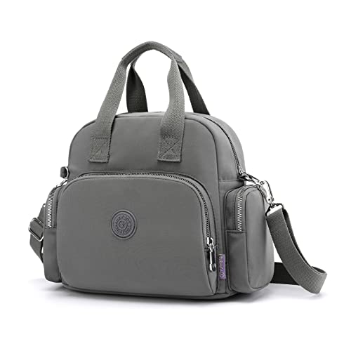 Sac à dos mode femme gris idéal pour vos voyages urbains et vos trajets quotidiens à l'école