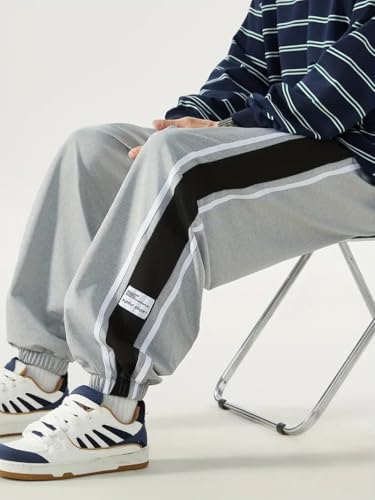 Image of Q - RIOUS Men's Black Colorblock Jogger Sweatpant | Contrast Side Stripe Sportswear | Casual & Gym Wear
