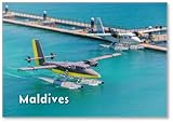 venom twin docking station (vs2851) xbox one Aimant puissant à l'arrière Maldives Seaplane Parking Next to New Floating Dock in Calm Blue Sea. Transport de voyage de luxe, tourisme exotique. Taxing Trans Maldivian Airways Twin Otter hydravions à mâle, aimant de