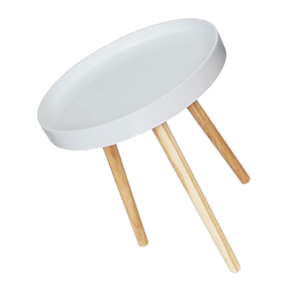 Table appoint ronde compacte pour optimiser l'espace pres du canape de salon