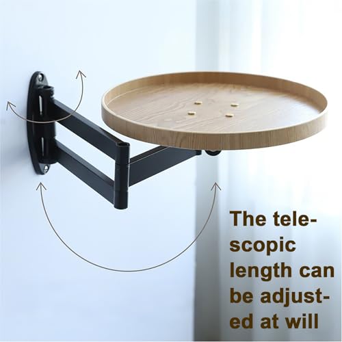 Table murale ronde pliante pour un coin repas de studio optimisé