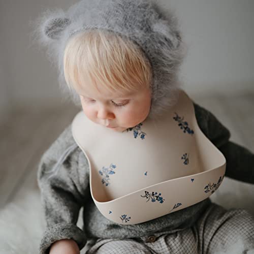 Image of mushie Silicone Baby Bib | Adjustable Fit Waterproof Bibs (Lilac Flowers)