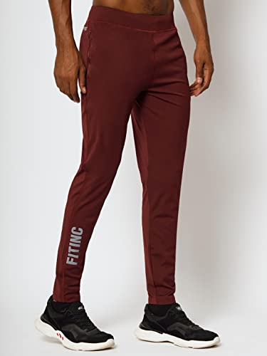 Image of FITINC Men's Stretchable Track Pant for Gym with Zipper Pockets