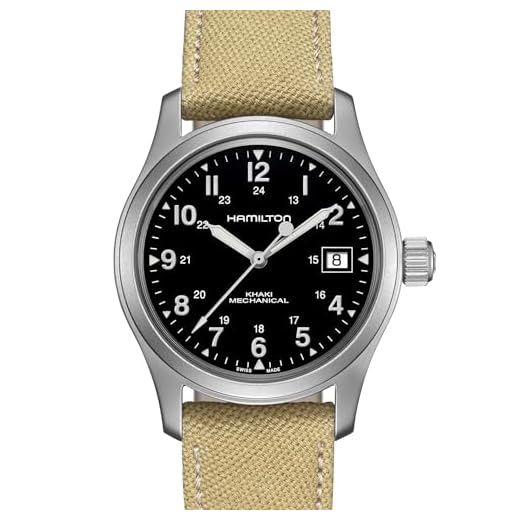 Hamilton Reloj Khaki Field mecánico, fabricado en Suiza, caja de acero inoxidable de 38 mm, esfera negra, correa de lona beige (modelo: H69439933), Negro -, Mecánico