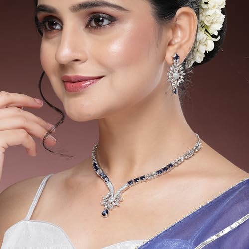 Image of ZENEME Rhodium Plated Brass Silver Toned Floral & Tear Drop Blue Crystal American Diamond Necklace With Earring Jewellery Set For Women
