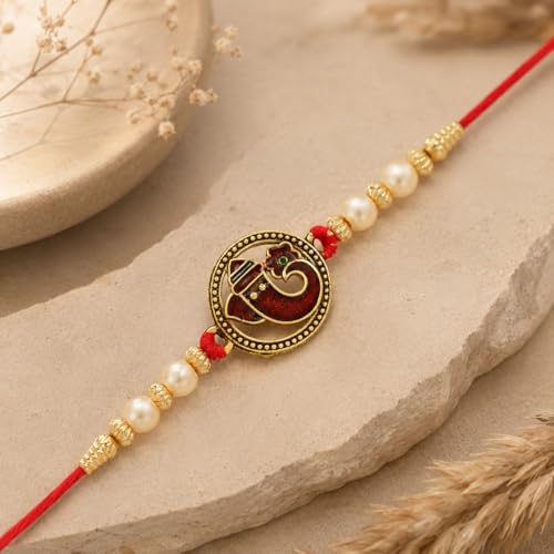 Image of Riddhika Ventures Religious Gold Plated Meenakari Sacred Ganesha Rakhi with Roli Chawal and Greeting Card